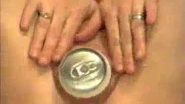 Sticking in a can of beer to satisfy the needs of her aching pussy
